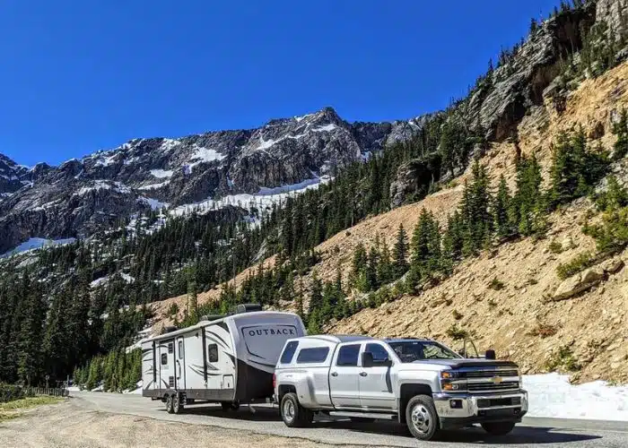 truck and travel trailer in the mountains - credit Pat Knoer Jennette