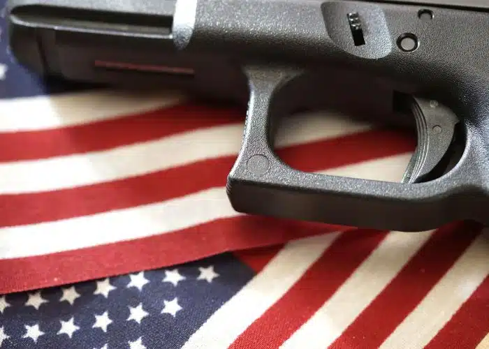 gun on american flag