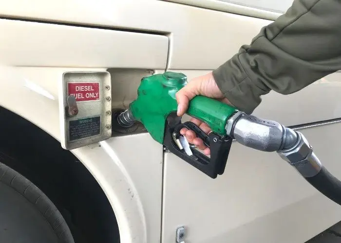 https://rvlove.com/wp-content/uploads/2020/12/700-x-500-close-up-of-marcs-hand-and-diesel-fuel-pump_rfw.jpg.webp