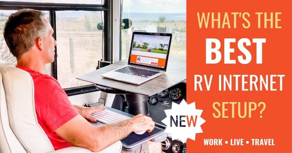 marc sits at RV driver seat office to work on laptop