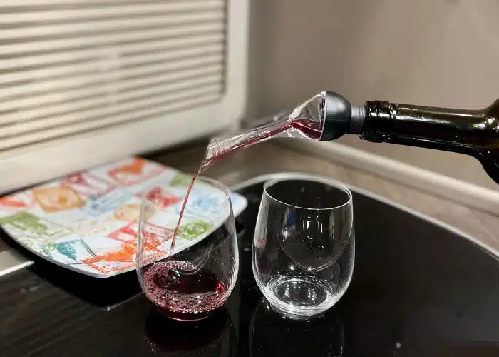 wine aerator and two wine glasses on RV counter