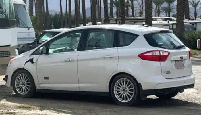 white ford Cmax hybrid tow car