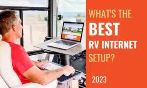 Best rv internet featured image 2023. person in RV working on computer via the internet