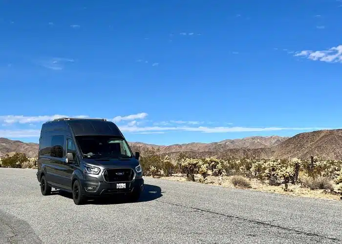 CLASS B van drives through national parkl