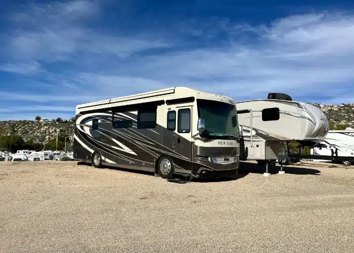 class a and fifth wheel rvs in storage at jojoba hills