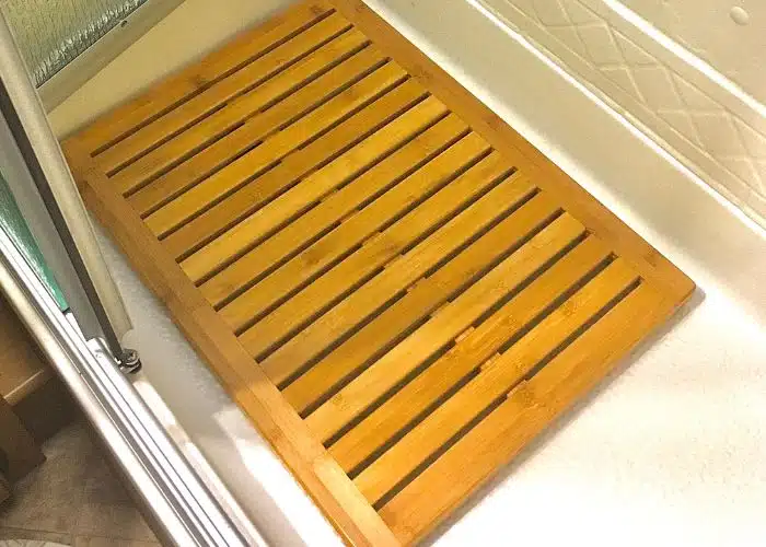 teak mat on floor of rv shower pan