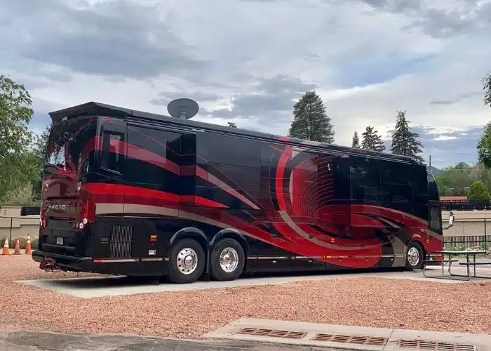 large class a luxury motorhome in campsite. What's my RV worth?