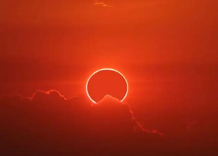 ring of fire annular eclipse red background