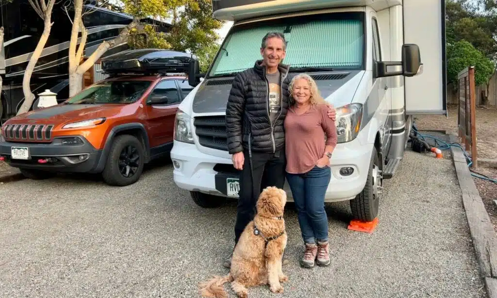 marc and julie and sunny stand by rv and jeep at marina dunes