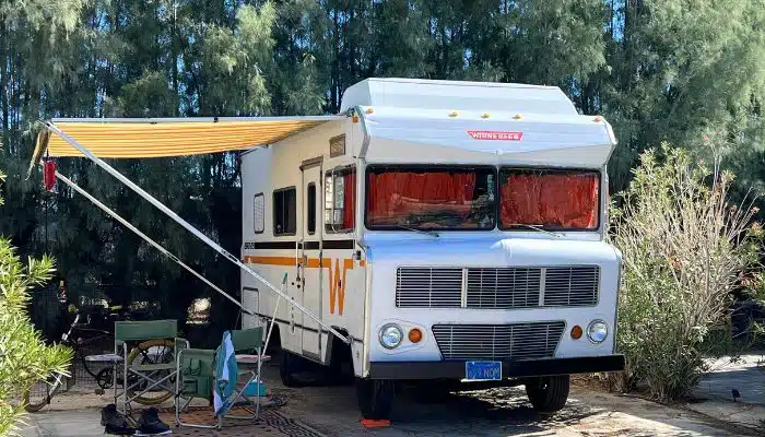 Vintage Winnebago motorhome with awning out