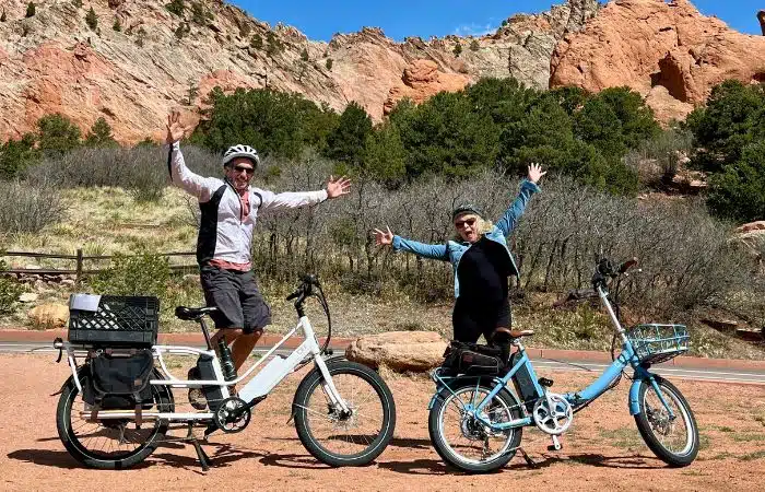 marc and julie jump in air at garden of the gods with blix bikes